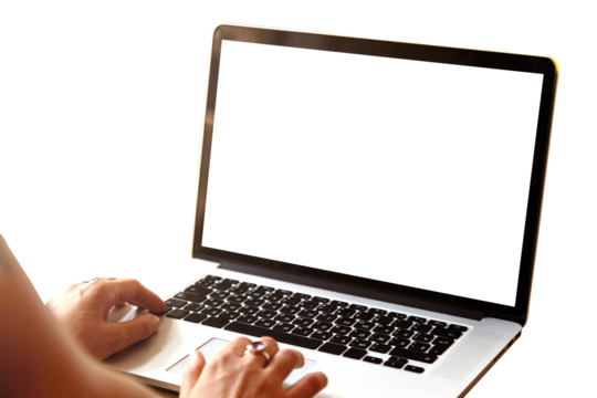Rear view of high school girl using laptop for doing homework, browsing Internet, searching for required information, sitting at desk with mobile phone with copy space screen lying next to her