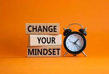 Change your mindset symbol. Concept words Change your mindset on wooden blocks with alarm clock....