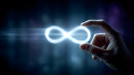 Glowing White Infinity Symbol Held by a Hand Dark Background
