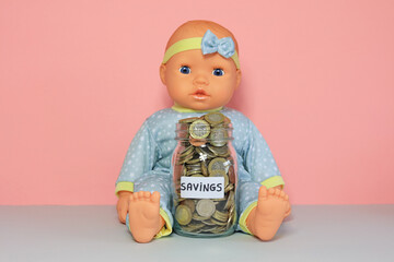 baby doll with savings jar
