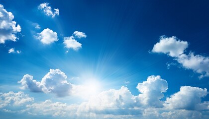 blue clouds and sun in the sky