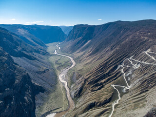 Mountain pass Katu-Yaryk. Valley of the mountain river Chulyshman. Landscape. Mountain dangerous road.