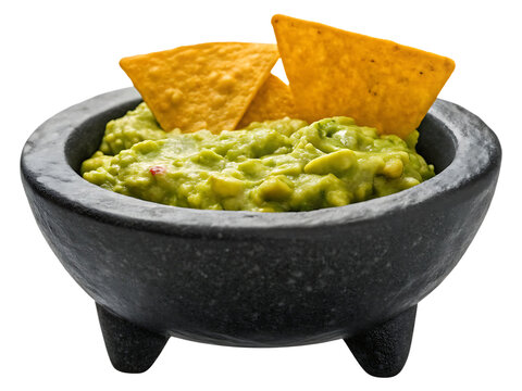 Delicious guacamole with tortilla chips isolated on a white background
