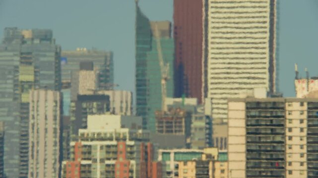 View of the city in Western Canada, experiencing heat with many hot dry days. Atmosphere air distortion with temperatures rising over 30 Celsius. Increasingly hot and torrid summer.