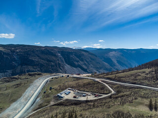 Construction of a new road to the Chulyshman River valley. Mountain pass Katu-Yaryk. Landscape. Mountain dangerous road.