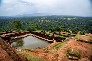 Stone ruins of the ancient fortress atop Sigiriya Rock, Sri Lanka—historic site with sweeping views and history