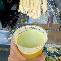 sugarcane juice in hand