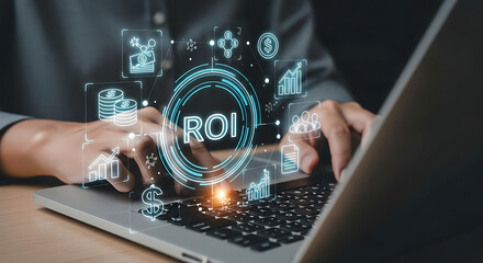Person using laptop computer analyzing financial data and ROI, showcasing growth charts and monetary icons, representing business strategy and investment.