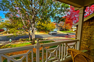 Suburban front porch ion a sunny autumn day