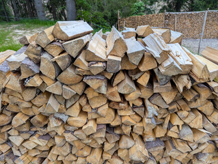 Cross-section background of a large number of firewood piles