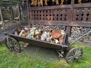 broken clay pots with patterns in a cart