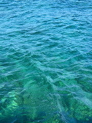 Blue turquoise sea waves surface.