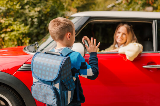 Back to School Drop Off – Smiling Child Waving Goodbye to Parent by Car on First Day of School