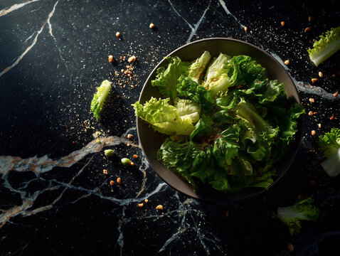 Fresh Mediterranean Greek Salad on a dark marble countertop