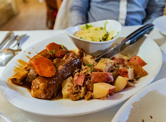 Close up shot of Italian style lamb shank in the Brick House Grill of Hot Springs