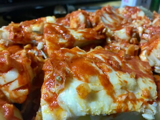 Traditional Basque Codfish Dish with Red Sauce