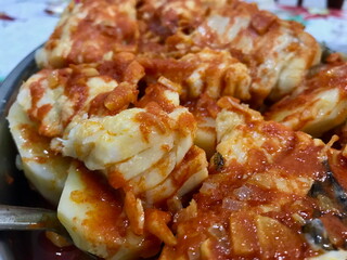 Traditional Basque Codfish Dish with Red Sauce