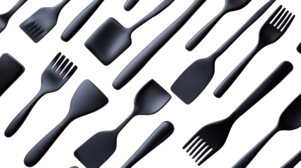 Variety of Black Kitchen Utensils Including Spatulas, Forks, and Spoons Arranged on a Dark Surface for Culinary Use and Design Inspiration