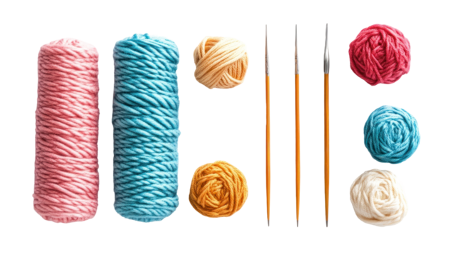 Colorful yarn spools and paint brushes on a white background for creative crafting and DIY projects