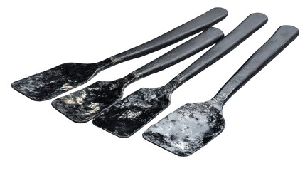 Set of Four Vintage Stainless Steel Spatulas with Worn Handles for Cooking and Baking