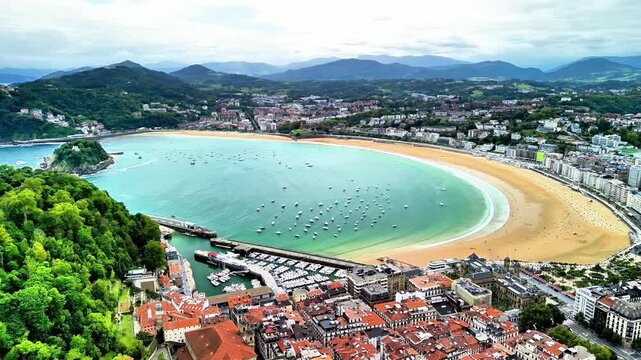 A breathtaking bird's-eye view of La Concha Beach in San Sebastian, showcasing the vibrant waters and landscape.