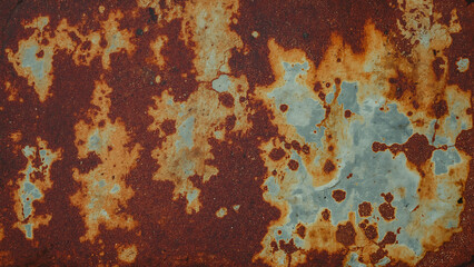 Fototapeta premium Metal texture with heavily rusted, peeling paint revealing aged beauty, perfect for backgrounds, industrial concepts, or textures in design projects.