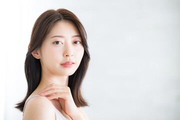 Beautiful young woman's bare skin feeling touching beautiful shoulders stiff shoulders and beauty...