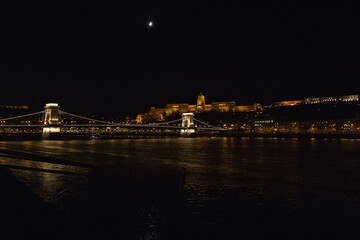 Danube embankment at the evening and night. Autumn in Budapest. Old architecture. High resolution...