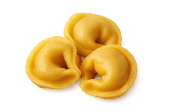 Uncooked tortellini revealing pasta's intricate texture and curved shape against transparent backdrop