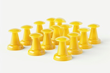 A collection of yellow push pins arranged on a white background.