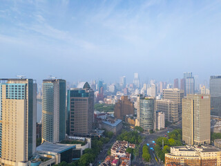Obraz premium Aerial view of Shanghai skyscrapers and residential buildings in downtown.