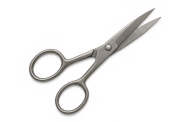 Classic metal scissors isolated on a transparent background, ready for integration into various design projects