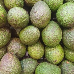 Piles of avocados in the supermarket