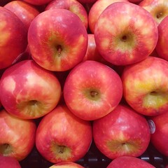 red apples neatly arranged as background