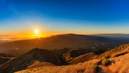 a sunrise hike up madonna mountain with beautiful views of san luis obispo california and its peaks
