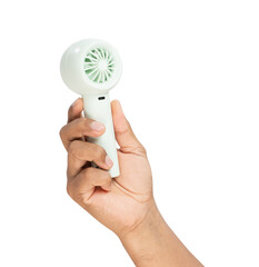 Man holding small portable fan on isolated background