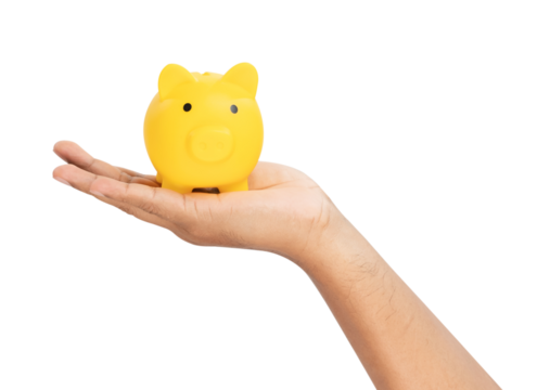 Hand holding yellow piggy bank for saving money on white background