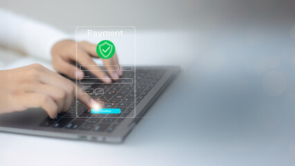 Close-up of a person typing on a laptop with a secure payment UI overlay.