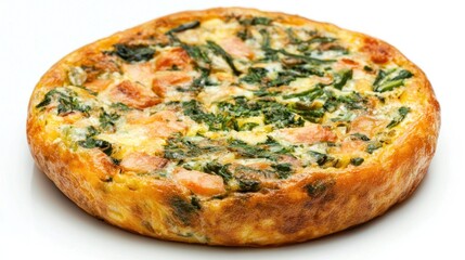 A round, golden-brown pizza with spinach and salmon toppings on a white plate.