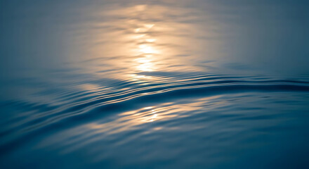 Fototapeta premium a mesmerizing, close-up shot of water. The ripples and patterns on the surface, along with the sunlight creates a sense of serenity.