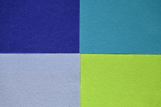 Colorful textured paper divided into four quadrants