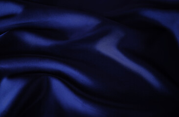 Obraz premium Azure, navy, denim, midnight, cobalt colorful background. Very dark blue indigo silk. Luxurious premium satin crumbled fabric. Wavy drapery folds. Curve. Twisted cloth. Smooth shiny drape.