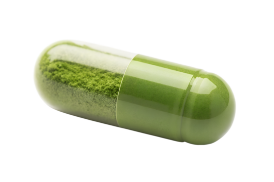 A green herbal capsule filled with powder isolated on transparent background