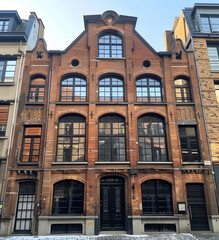 Fototapeta premium Exterior view of a charming brick building with modern touches