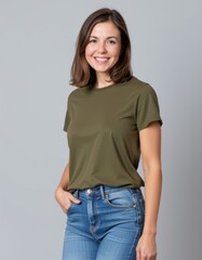 Obraz premium Casual fashion shoot studio portrait of woman in olive t-shirt minimalist background smiling expression