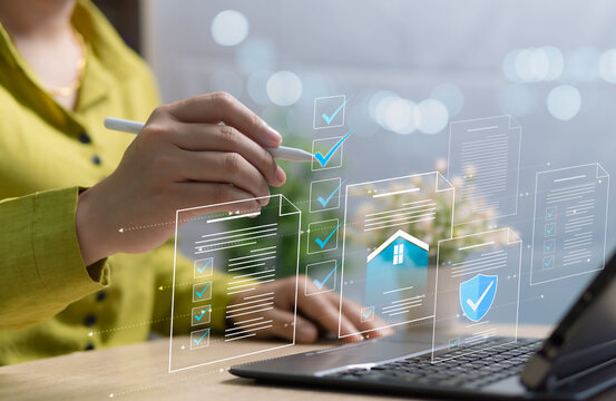Concept of data analysis and review, document management, auditing including project approval, electronic documents of agreement on terms and conditions, business woman sitting working with laptop.