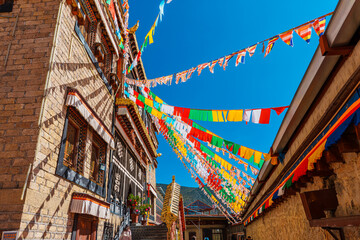 Colorful Tibetan Prayer Flags and Architecture of Songzanlin Monastery