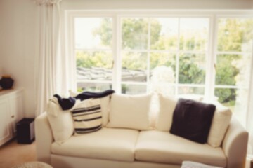 Sofa against window at home