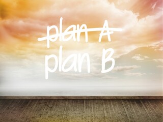 Plan a and b written on wall with sky