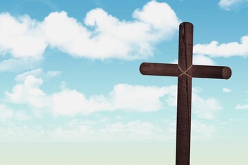 Flat design featuring roped wooden cross standing against turquoise sky with clouds over horizon
